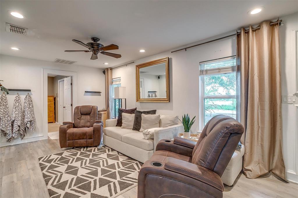 3147 Tin Top Road Weatherford, TX 76087 - Photo 7 of 40 a living room with furniture and a large window