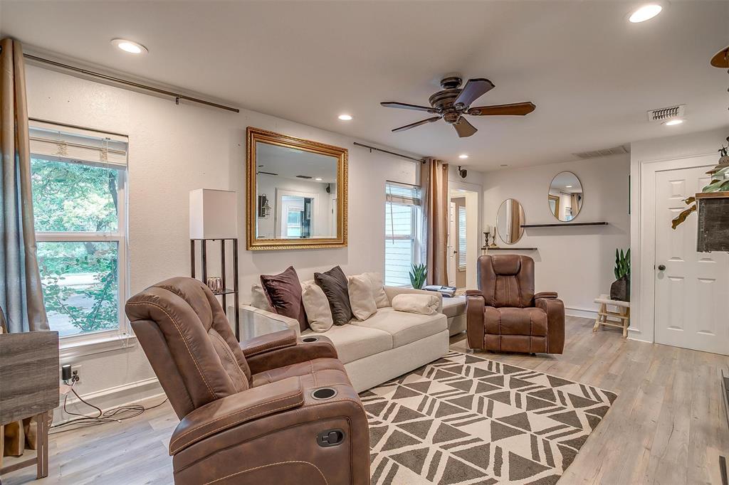3147 Tin Top Road Weatherford, TX 76087 - Photo 8 of 40 a living room with furniture ceiling fan and a window