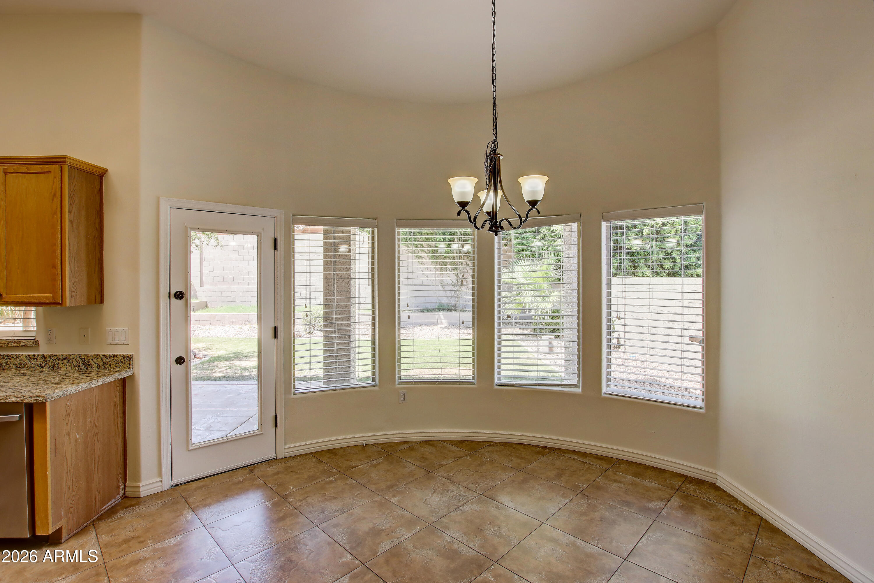 1918 East Marilyn Road Phoenix, AZ 85022 - Photo 23 of 43 a view of an empty room with a window