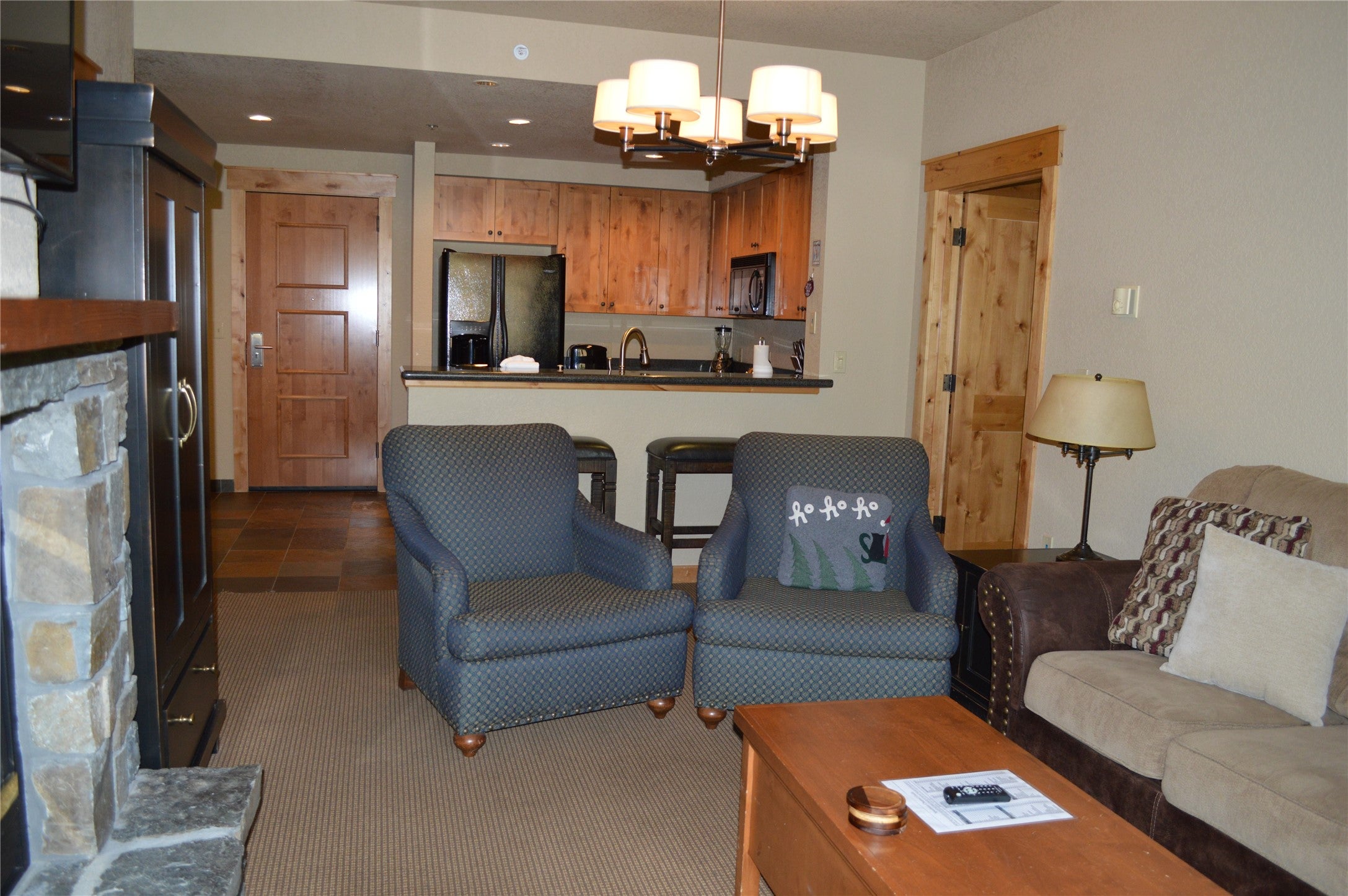 3893 Big Mountain Road, Unit R304 Whitefish, MT 59937 - Photo 8 of 25 Living Room to Kitchen