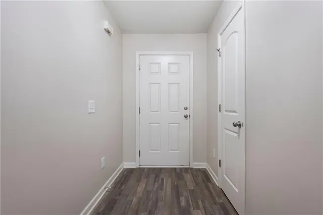 a view of small space with wooden floor