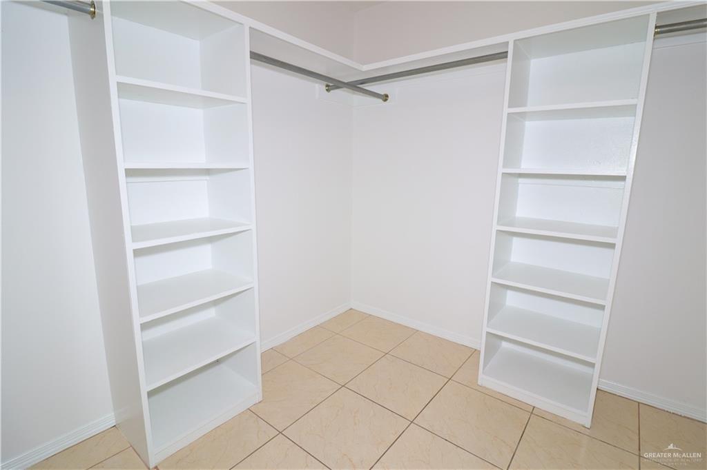 2009 Roman Street Mission, TX 78573 - Photo 18 of 22 a view of an empty walk in closet