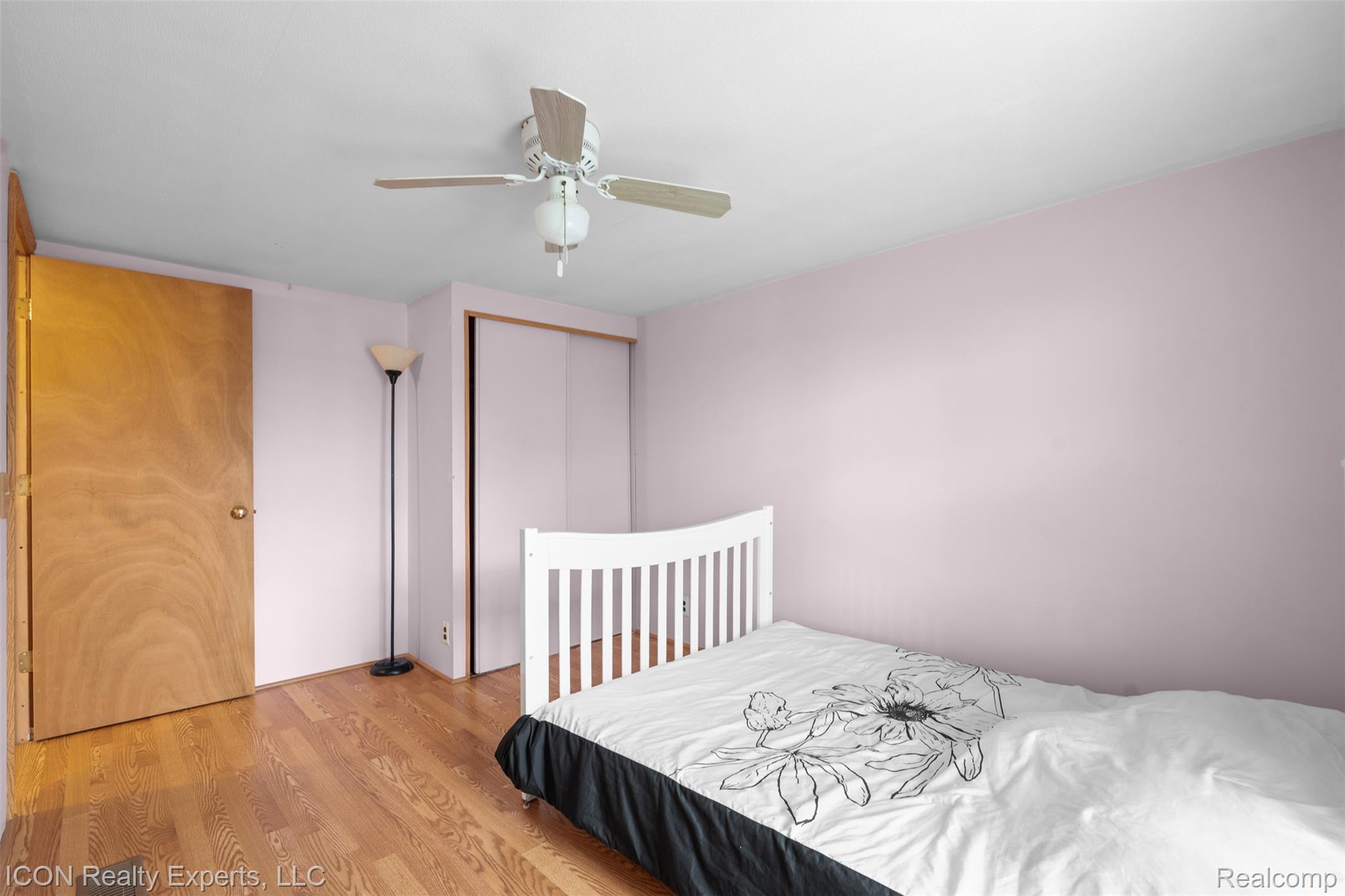 13620 Gilbert Road Allenton, MI 48002 - Photo 19 of 47 Bedroom featuring light wood-style floors, a closet, and a ceiling fan
