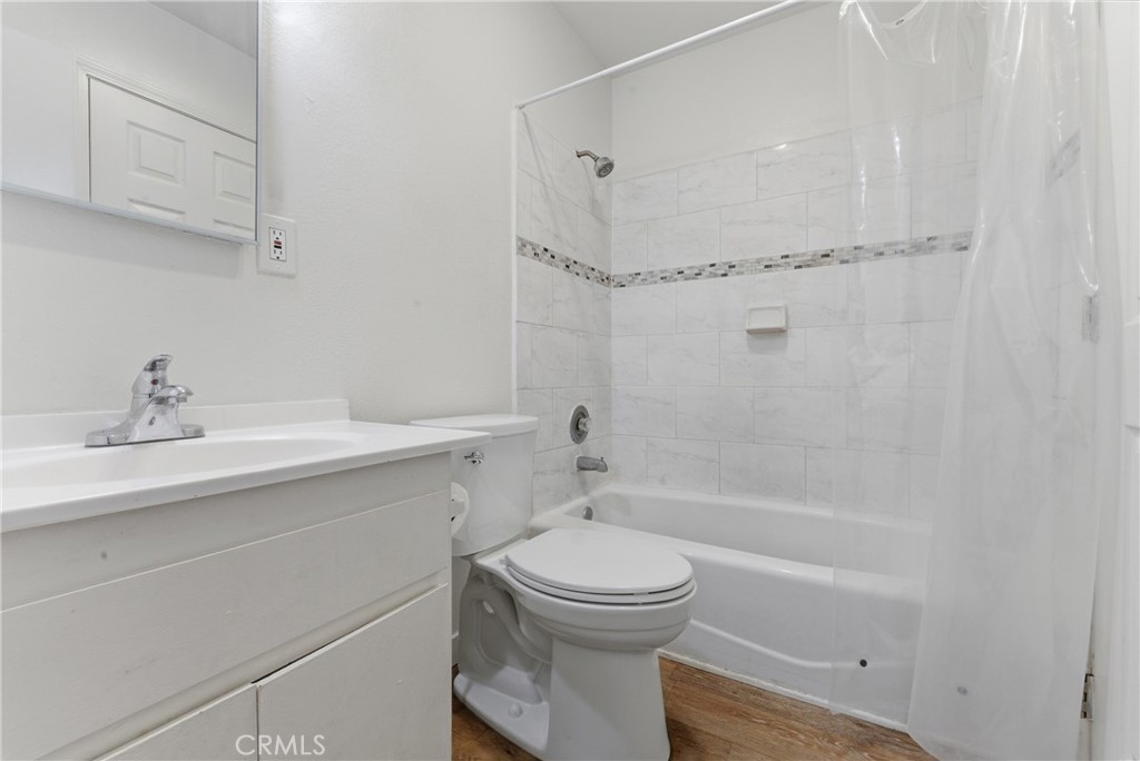 7085 Fulton Way Stanton, CA 90680 - Photo 21 of 34 a bathroom with a sink toilet and shower