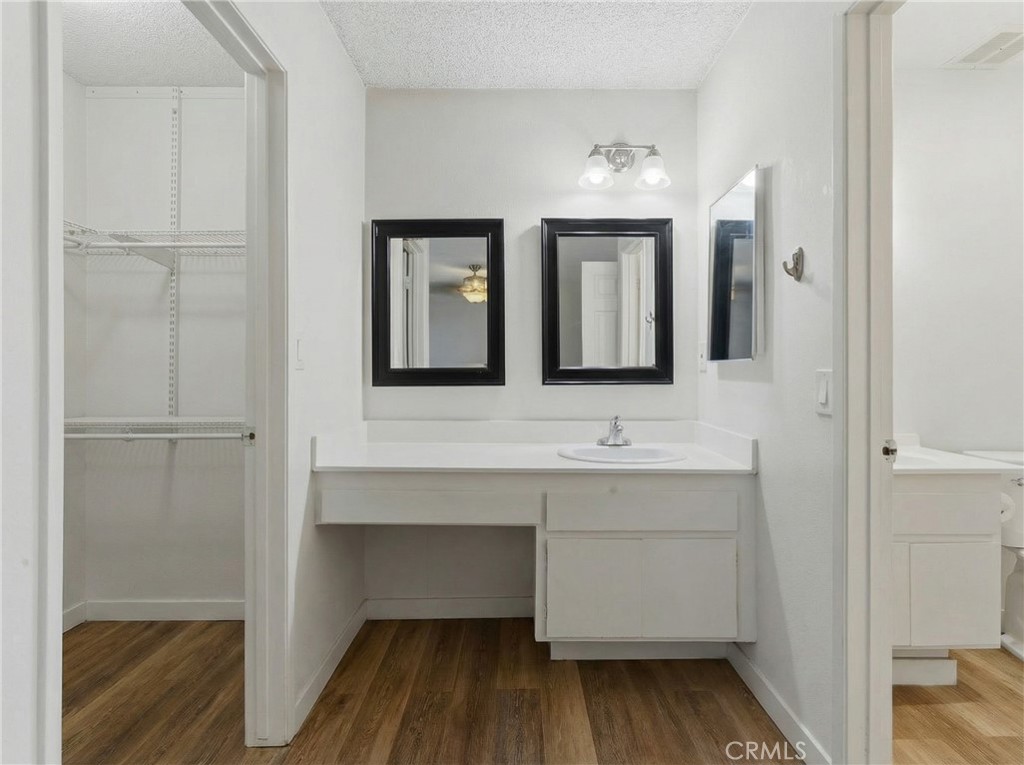 7085 Fulton Way Stanton, CA 90680 - Photo 23 of 34 a bathroom with a sink and a mirror