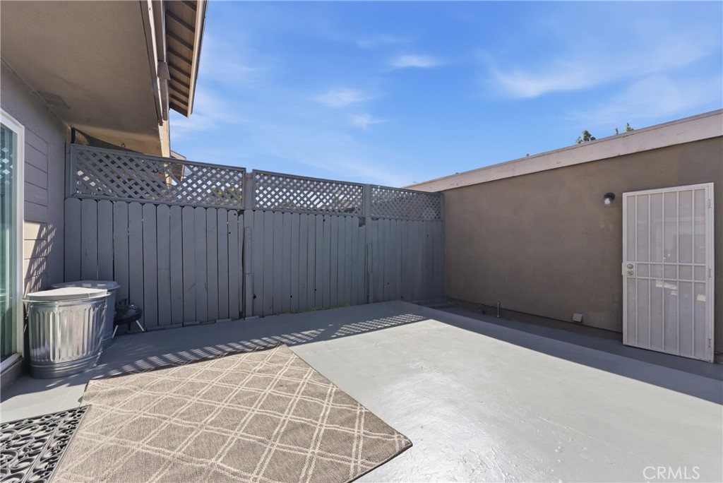 7085 Fulton Way Stanton, CA 90680 - Photo 24 of 34 a view of an empty room with a wooden door
