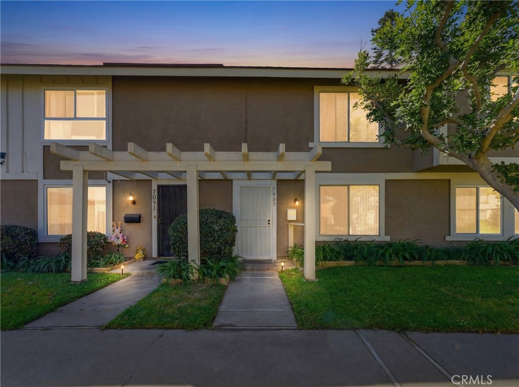 7085 Fulton Way Stanton, CA 90680 - Photo 34 of 34 a front view of a house with garden