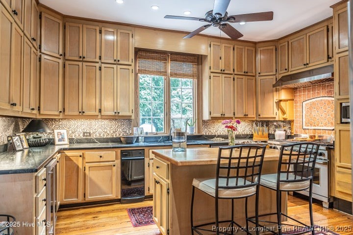11102 Old Johns Road Laurinburg, NC 28352 - Photo 13 of 42 a kitchen with stainless steel appliances granite countertop a sink and cabinets