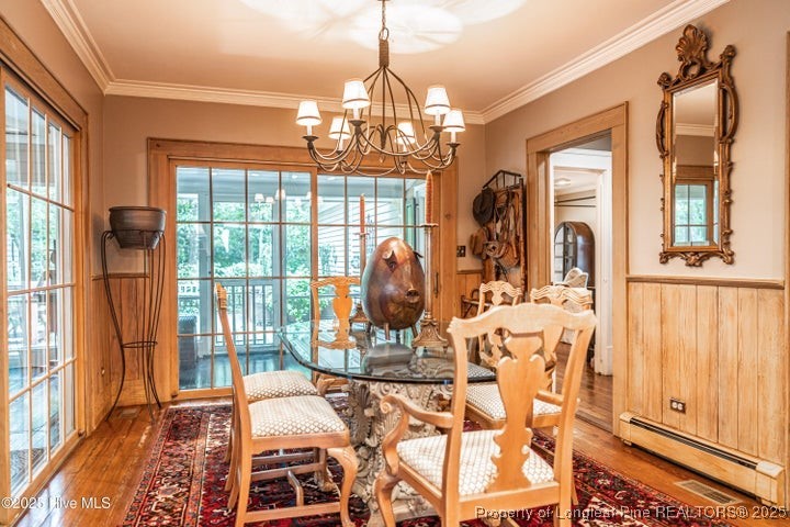 11102 Old Johns Road Laurinburg, NC 28352 - Photo 16 of 42 a view of a dining room with furniture window and outside view