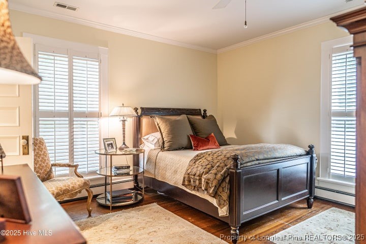 11102 Old Johns Road Laurinburg, NC 28352 - Photo 35 of 42 a bed room with a bed and a couch