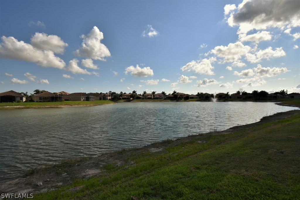 11674 Eros Road Lehigh Acres, FL 33971 - Photo 26 of 35 a view of a lake