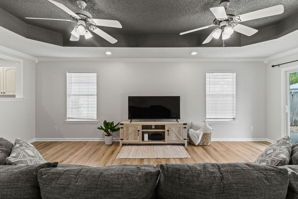 1791 Old Ranch Road Fort Walton Beach, FL 32547 - Photo 13 of 30 a living room with furniture and a flat screen tv