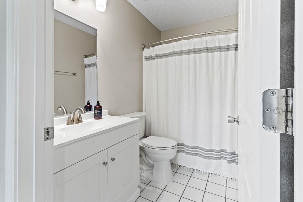 1791 Old Ranch Road Fort Walton Beach, FL 32547 - Photo 24 of 30 a bathroom with a sink toilet and shower