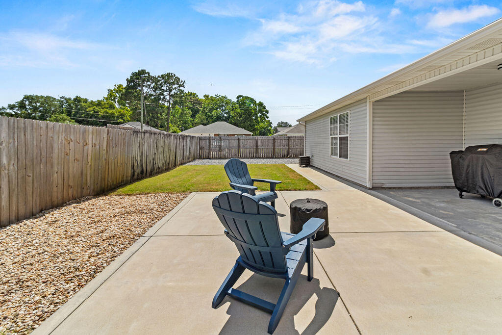 1791 Old Ranch Road Fort Walton Beach, FL 32547 - Photo 27 of 30 a view of backyard with swimming pool and seating space
