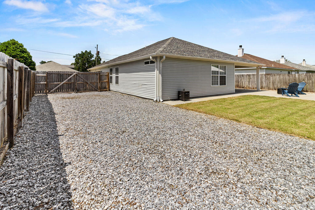 1791 Old Ranch Road Fort Walton Beach, FL 32547 - Photo 29 of 30 a view of a house with a backyard