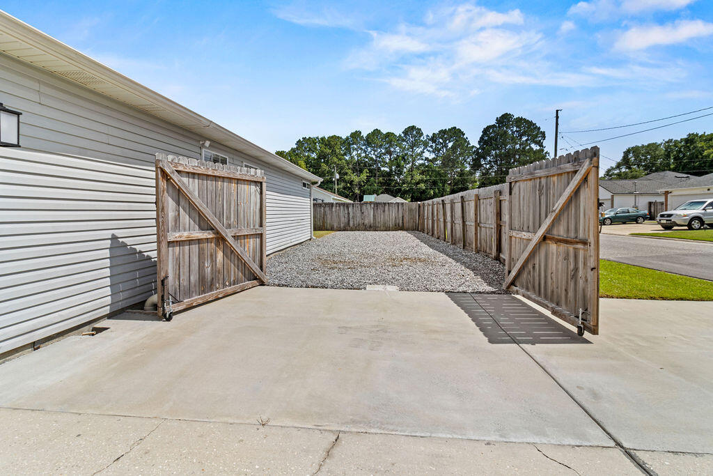 1791 Old Ranch Road Fort Walton Beach, FL 32547 - Photo 30 of 30 a view of backyard with wooden fence