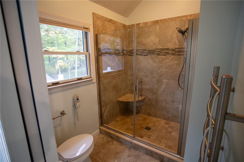 357 Morningstar Lane Neshannock, PA 16105 - Photo 13 of 25 a bathroom with a shower and toilet
