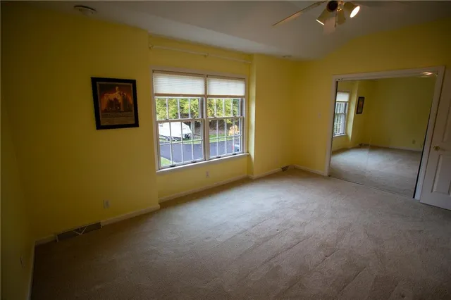 an empty room with windows