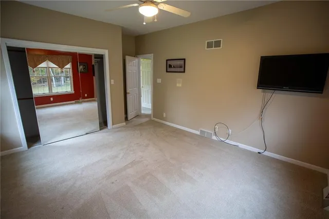 a view of a livingroom with a flat screen tv