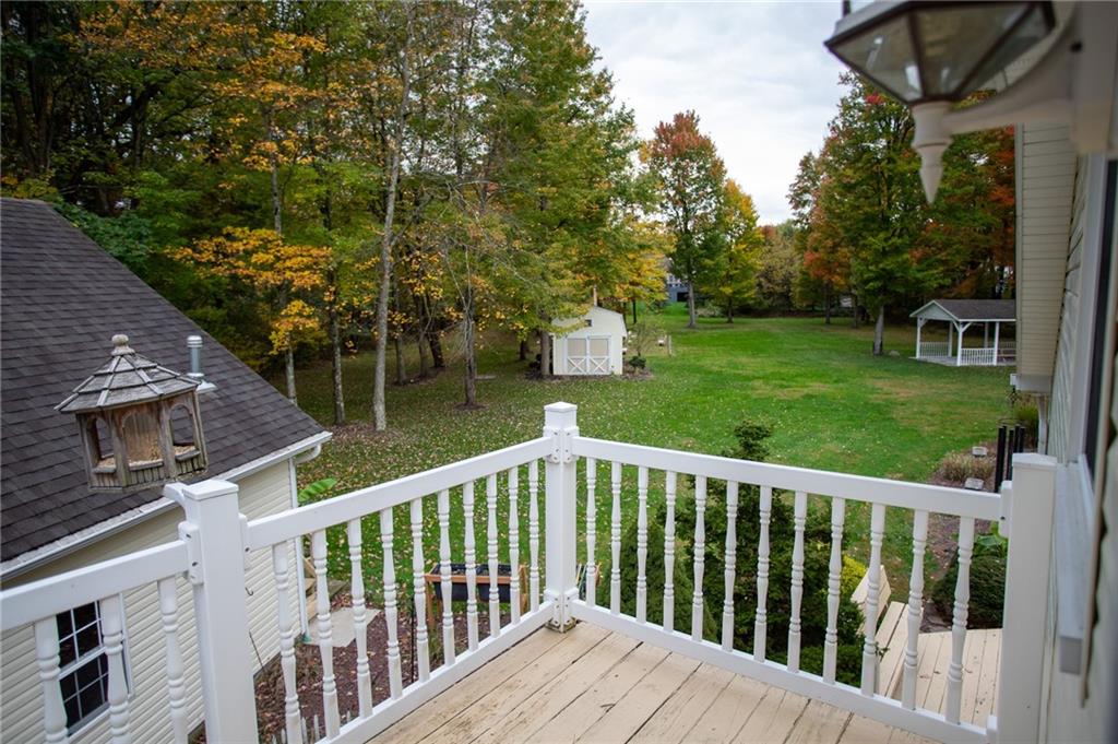 357 Morningstar Lane Neshannock, PA 16105 - Photo 24 of 25 a view of a wooden deck and yard with green space