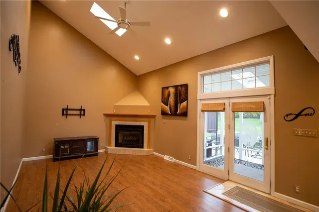 a bedroom with a bed and a fireplace