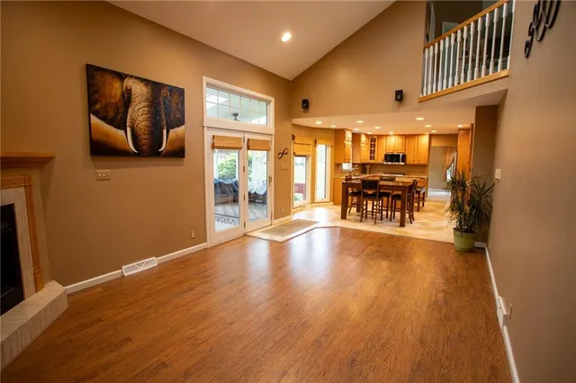 a view of dining room with furniture and wooden floor