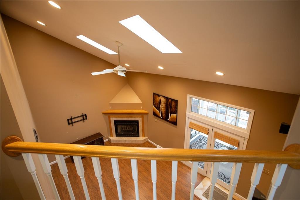 357 Morningstar Lane Neshannock, PA 16105 - Photo 8 of 25 a view of a livingroom with a fireplace and a window