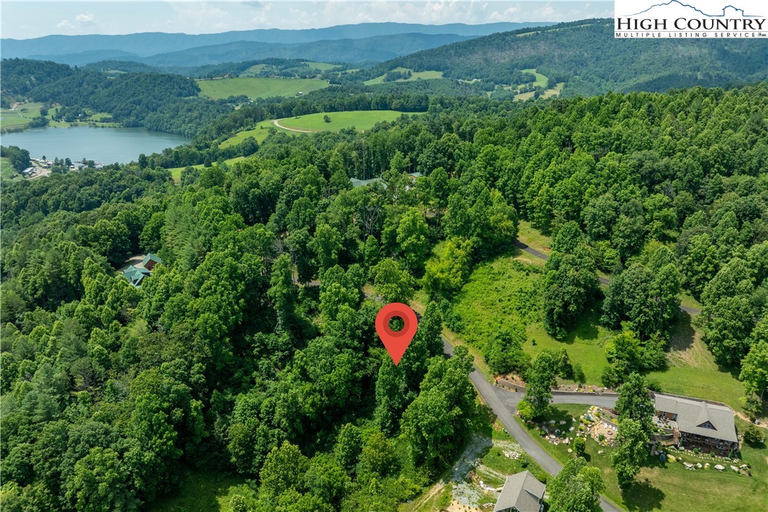 Lot 10 Lake Ridge Butler, TN 37640 - Photo 7 of 24 an aerial view of residential house with outdoor space and trees all around