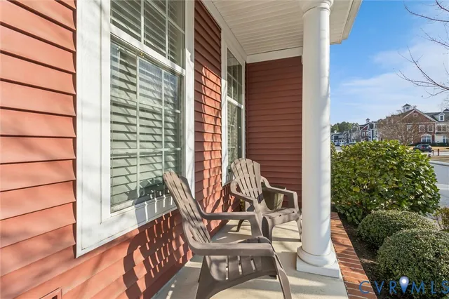 a view of a balcony with chairs