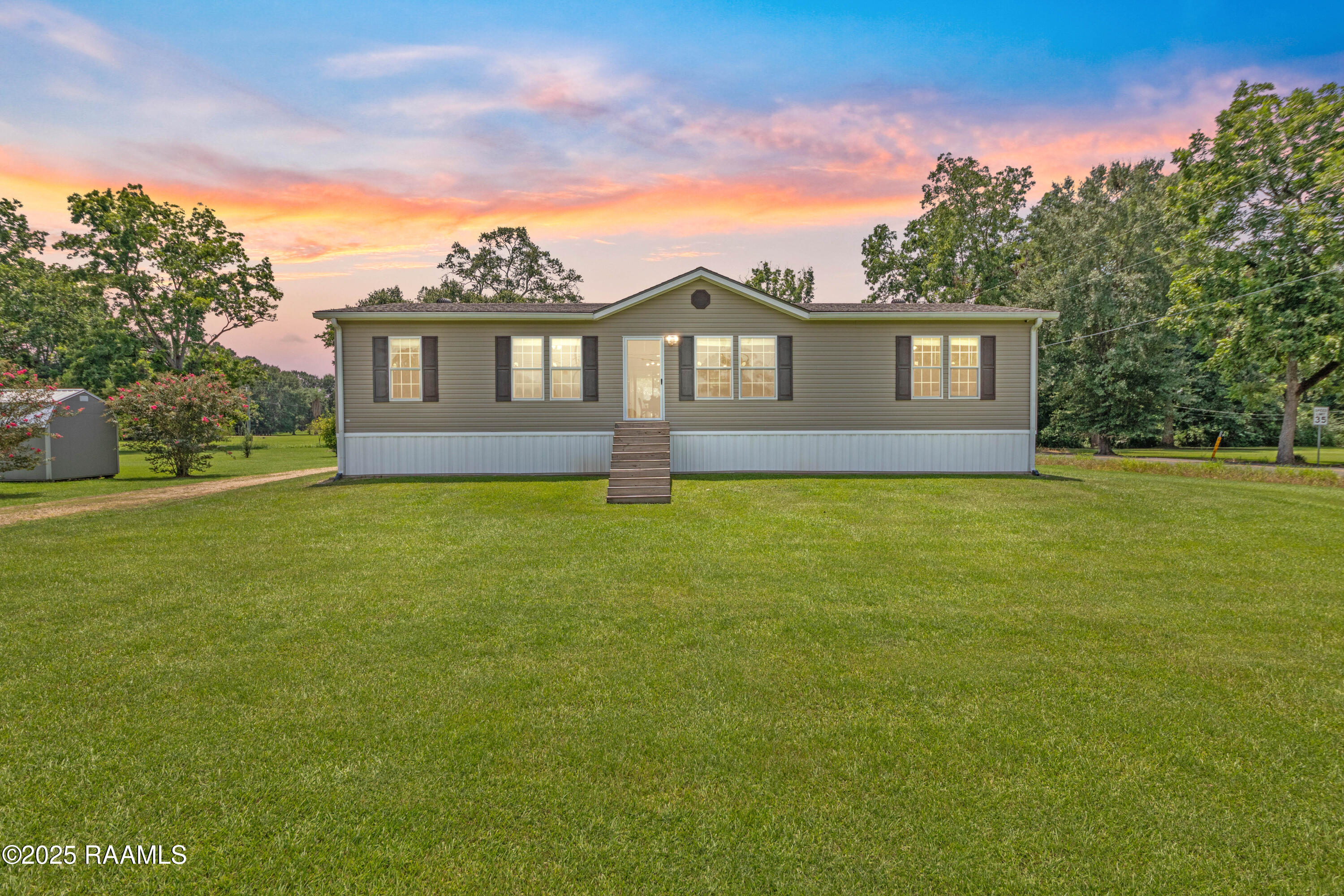 825 Ombrage Road Carencro, LA 70520 - Photo 3 of 32 twilight