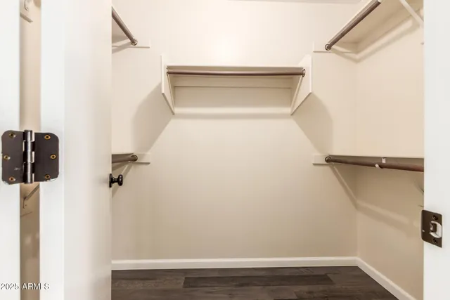 a view of small space with racks on the wall