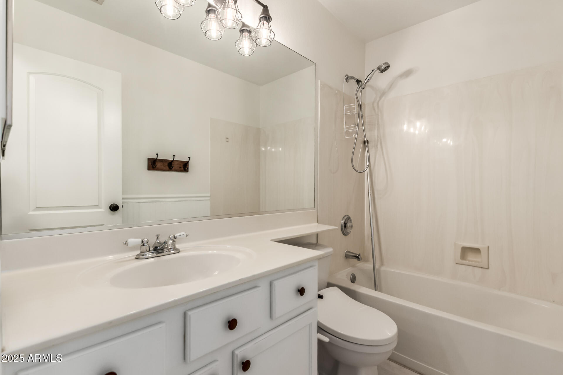 1132 North Hudson Place Chandler, AZ 85225 - Photo 25 of 34 a bathroom with a sink a toilet and shower