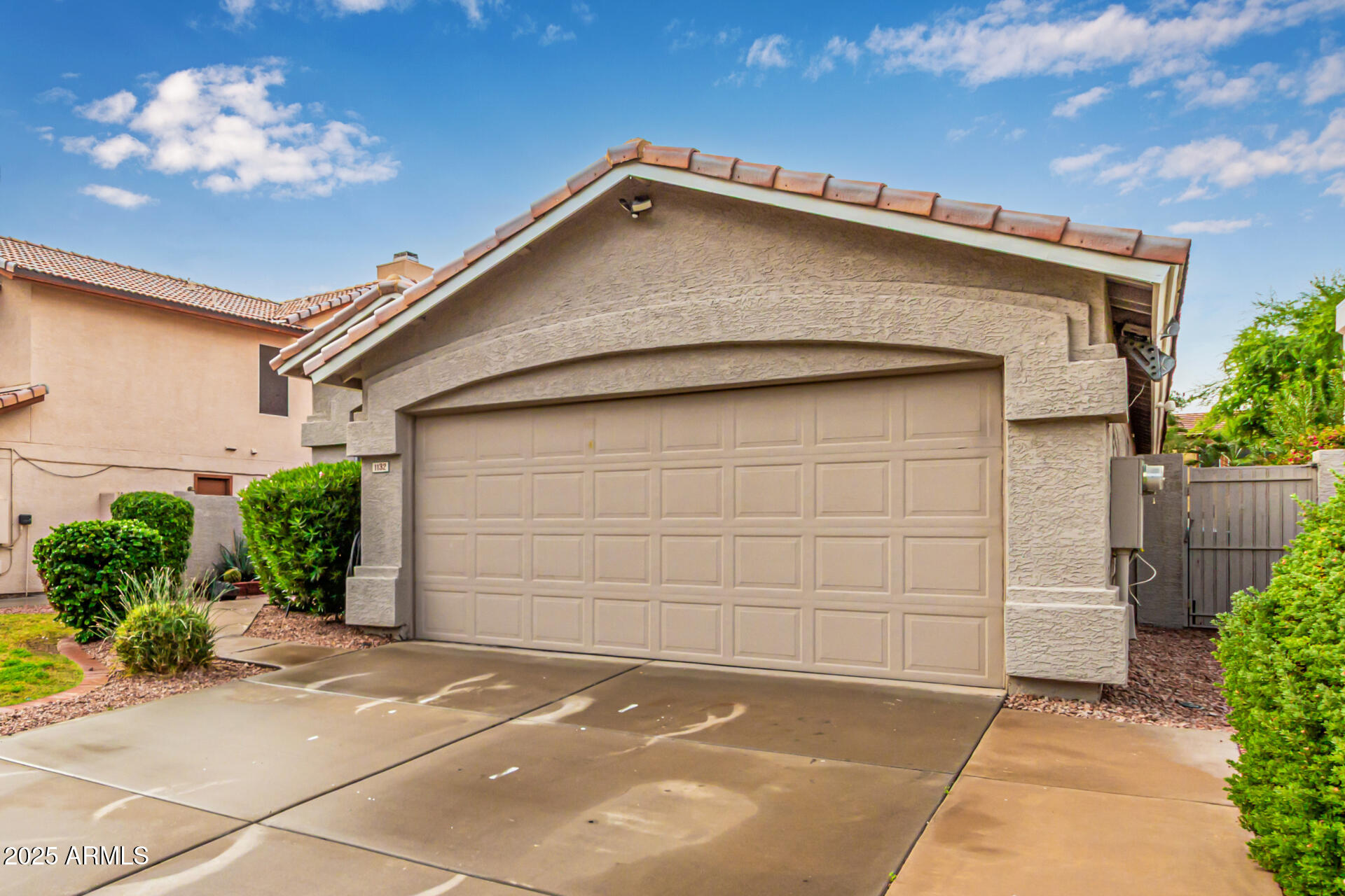 1132 North Hudson Place Chandler, AZ 85225 - Photo 4 of 34 a view of a house with a garage