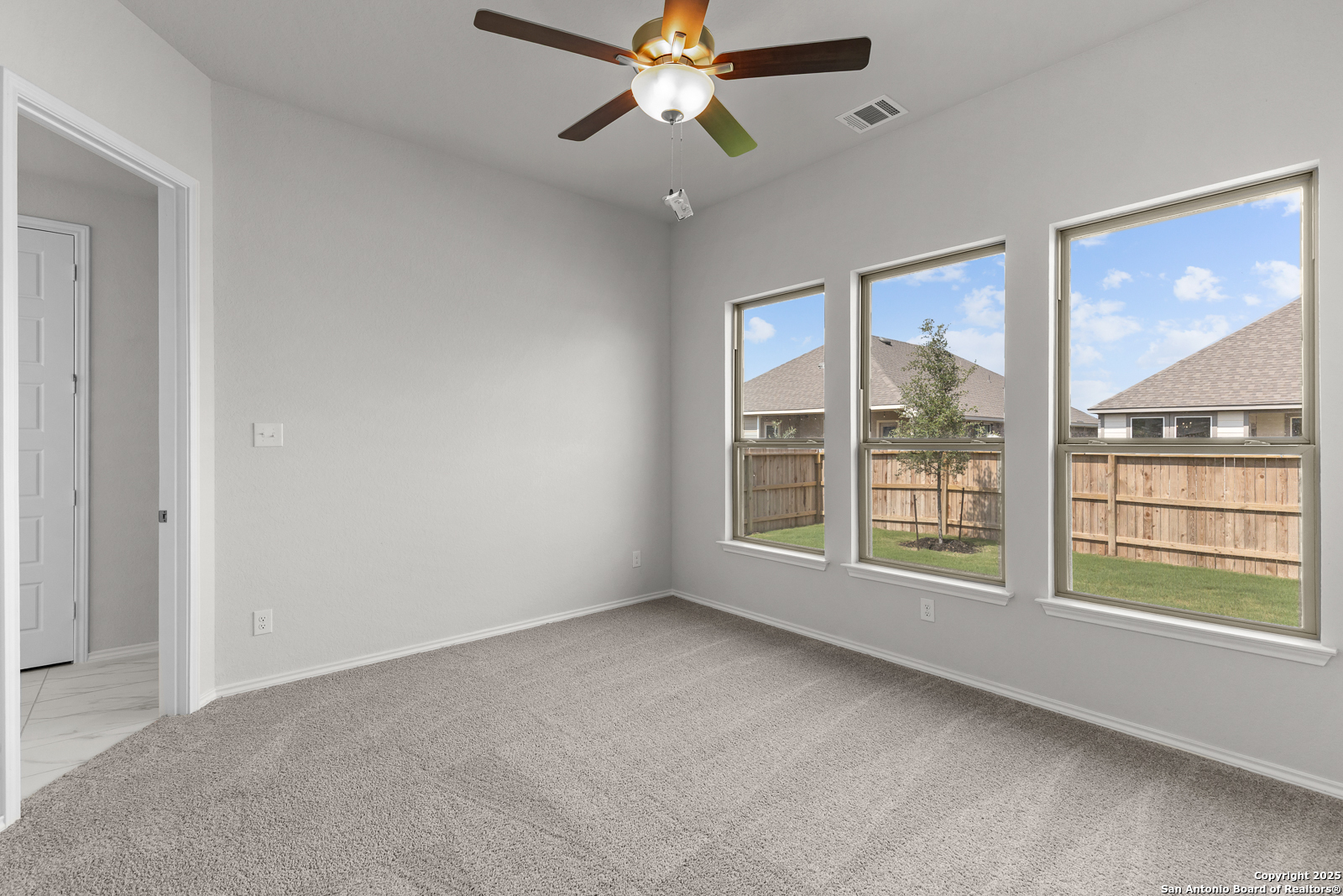 119 Mallorys Way Castroville, TX 78009 - Photo 11 of 24 a view of an empty room with a window