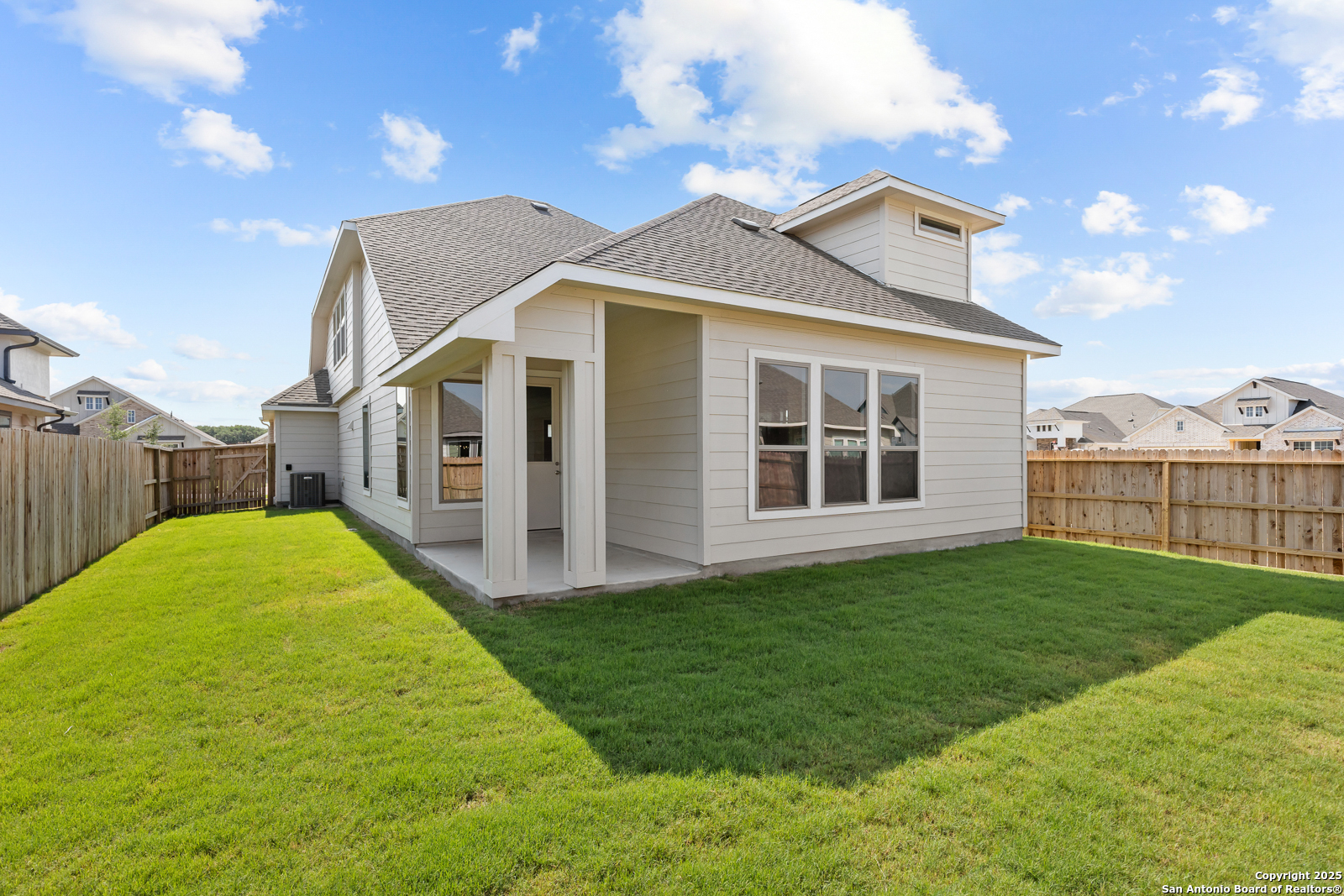 119 Mallorys Way Castroville, TX 78009 - Photo 3 of 24 a view of a house with backyard and porch