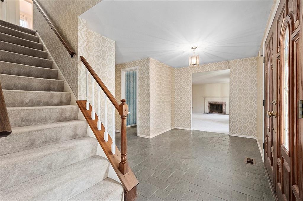 1619 Tiffany Ridge Drive Pittsburgh, PA 15241 - Photo 4 of 25 a view of entryway and hall with wooden floor
