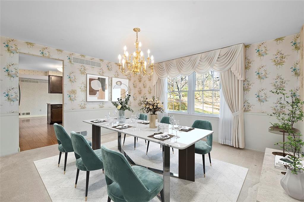 1619 Tiffany Ridge Drive Pittsburgh, PA 15241 - Photo 7 of 25 a view of a dining room with furniture and chandelier