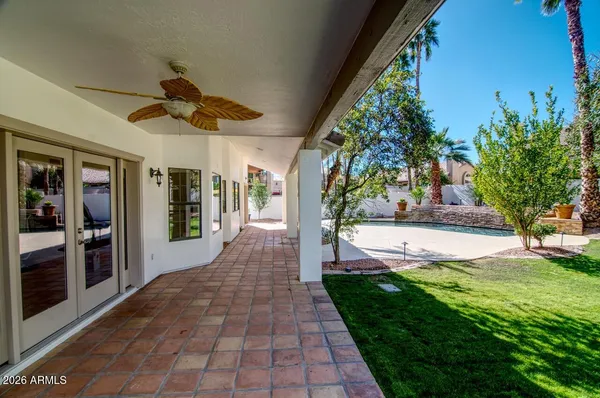 a view of a porch and garden