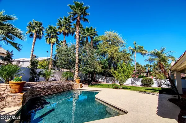 a view of a backyard with a garden