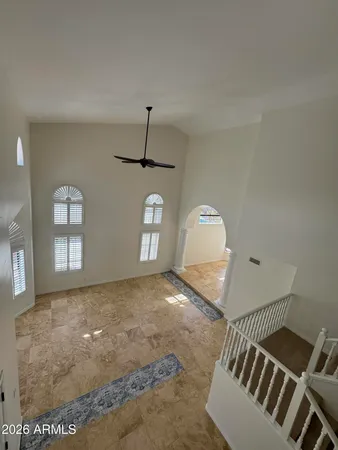 a view of a livingroom with a staircase