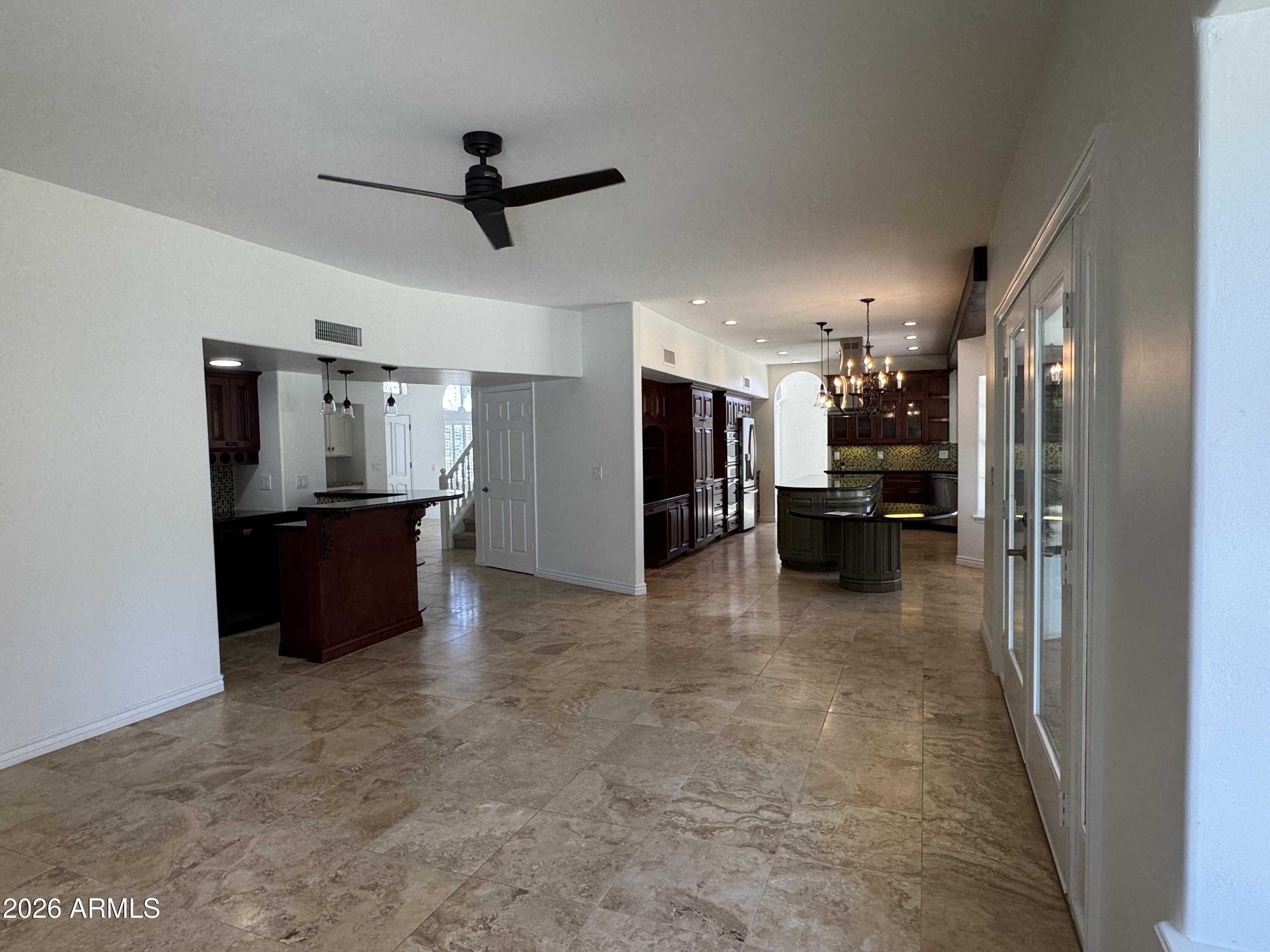 16006 South 36th Street Phoenix, AZ 85048 - Photo 39 of 47 Family Room to Bar and Kitchen