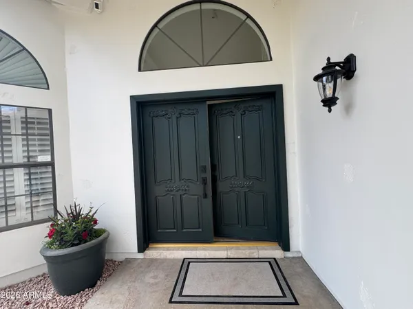 a vase of flowers sitting on a table