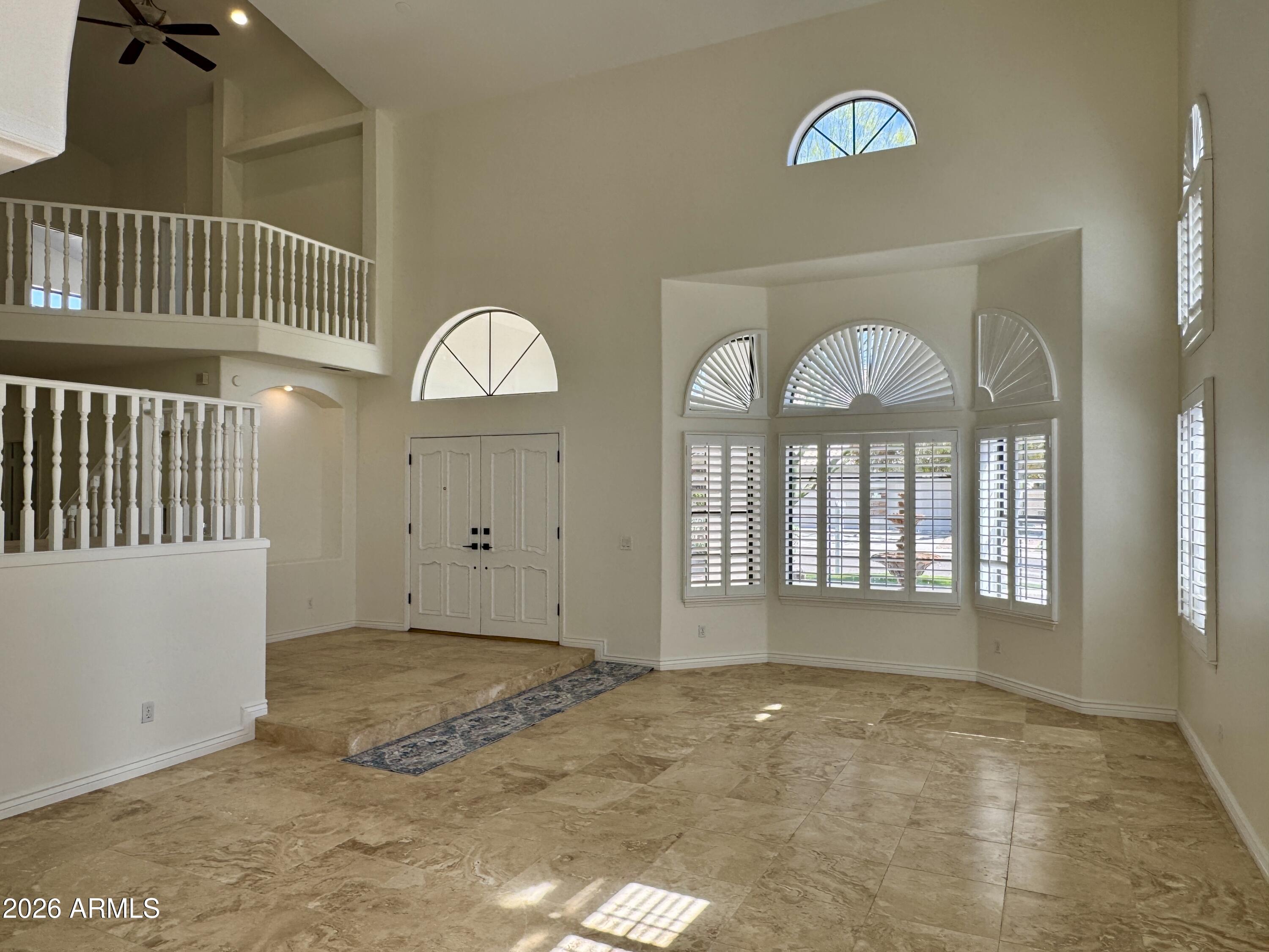 16006 South 36th Street Phoenix, AZ 85048 - Photo 5 of 47 Foyer and Living Room