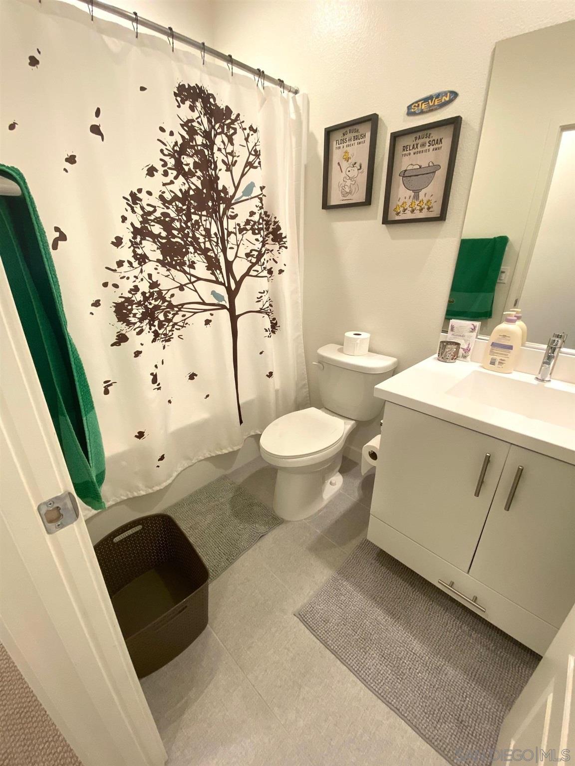 2135 Celestial Way, Unit 2 Chula Vista, CA 91915 - Photo 15 of 24 a bathroom with a sink toilet and shower