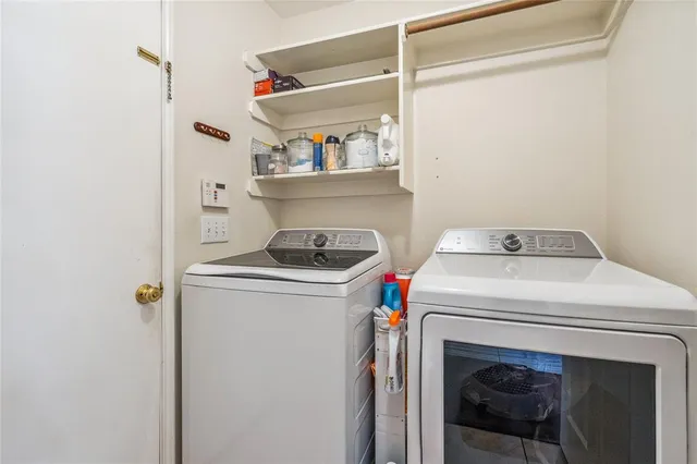 a utility room with dryer and washer