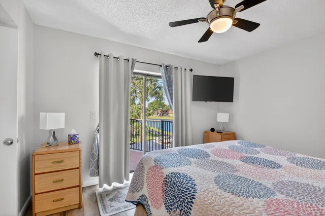 a bedroom with a bed and a walk in closet