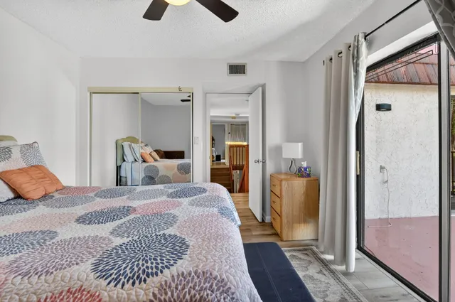 a bathroom with a toilet and shower