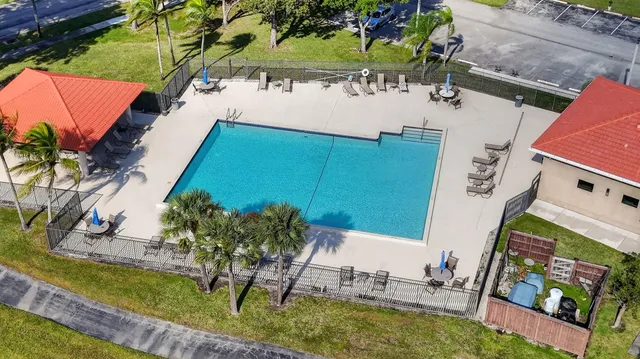 a view of swimming pool with a patio
