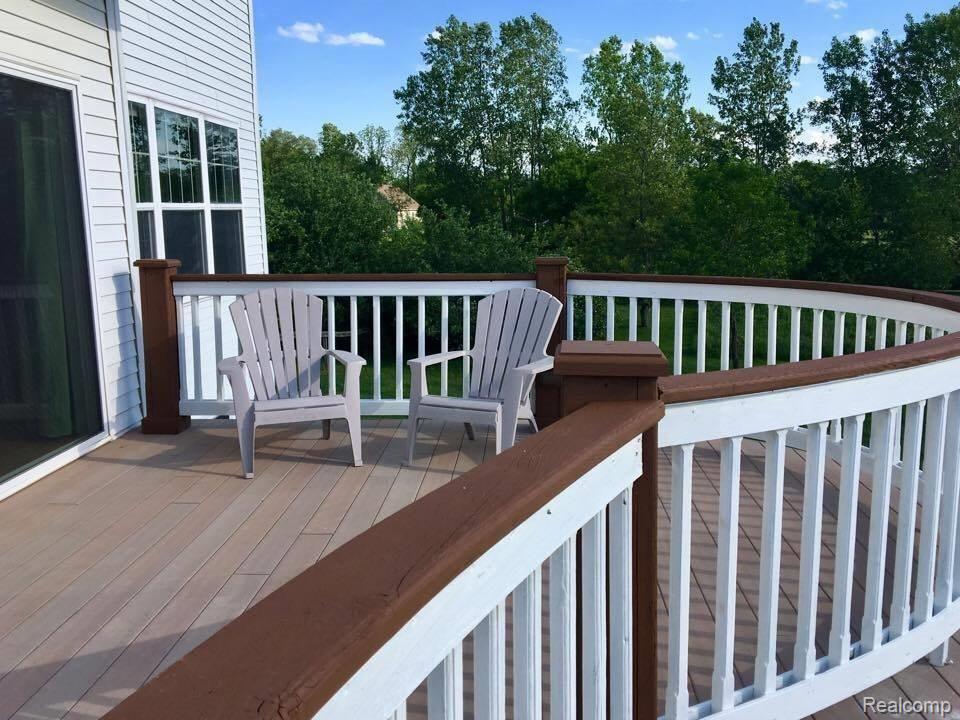 9087 North Owosso Road Fowlerville, MI 48836 - Photo 23 of 29 9087 owosso deck 2.jpg