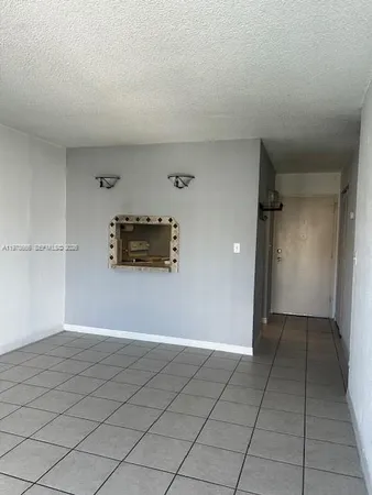 a view of a livingroom with wooden floor